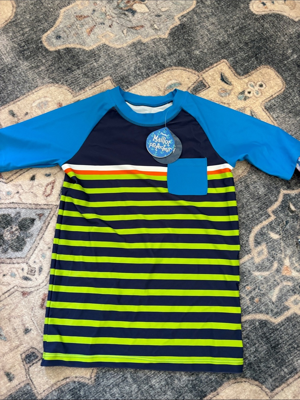 NWT. Hatley Blue Sleeve Rashguard with Navy and Neon Green Stripes, size 7